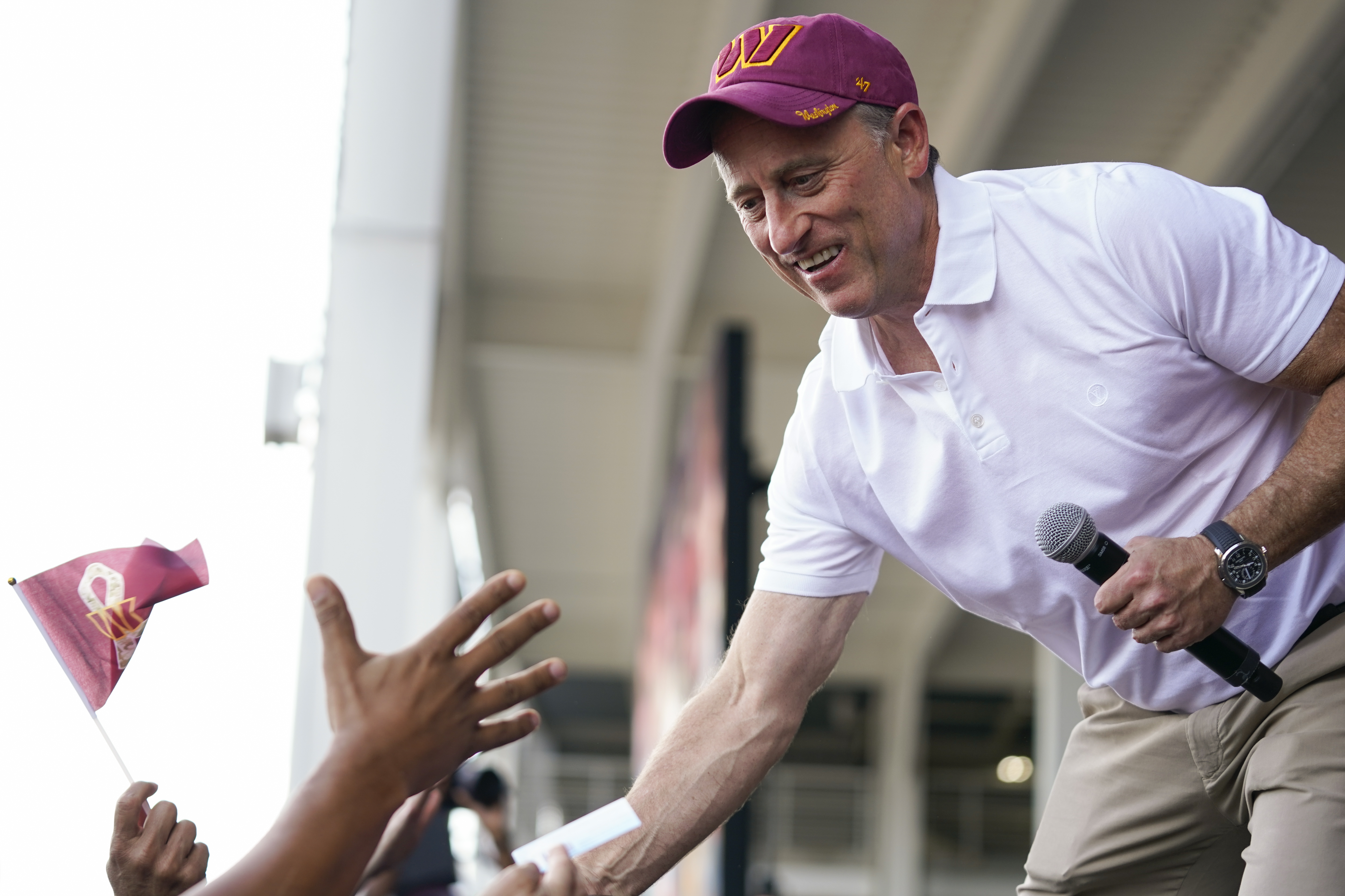 New Commanders owner Josh Harris buys beer for fans celebrating Dan  Snyder's sale of franchise