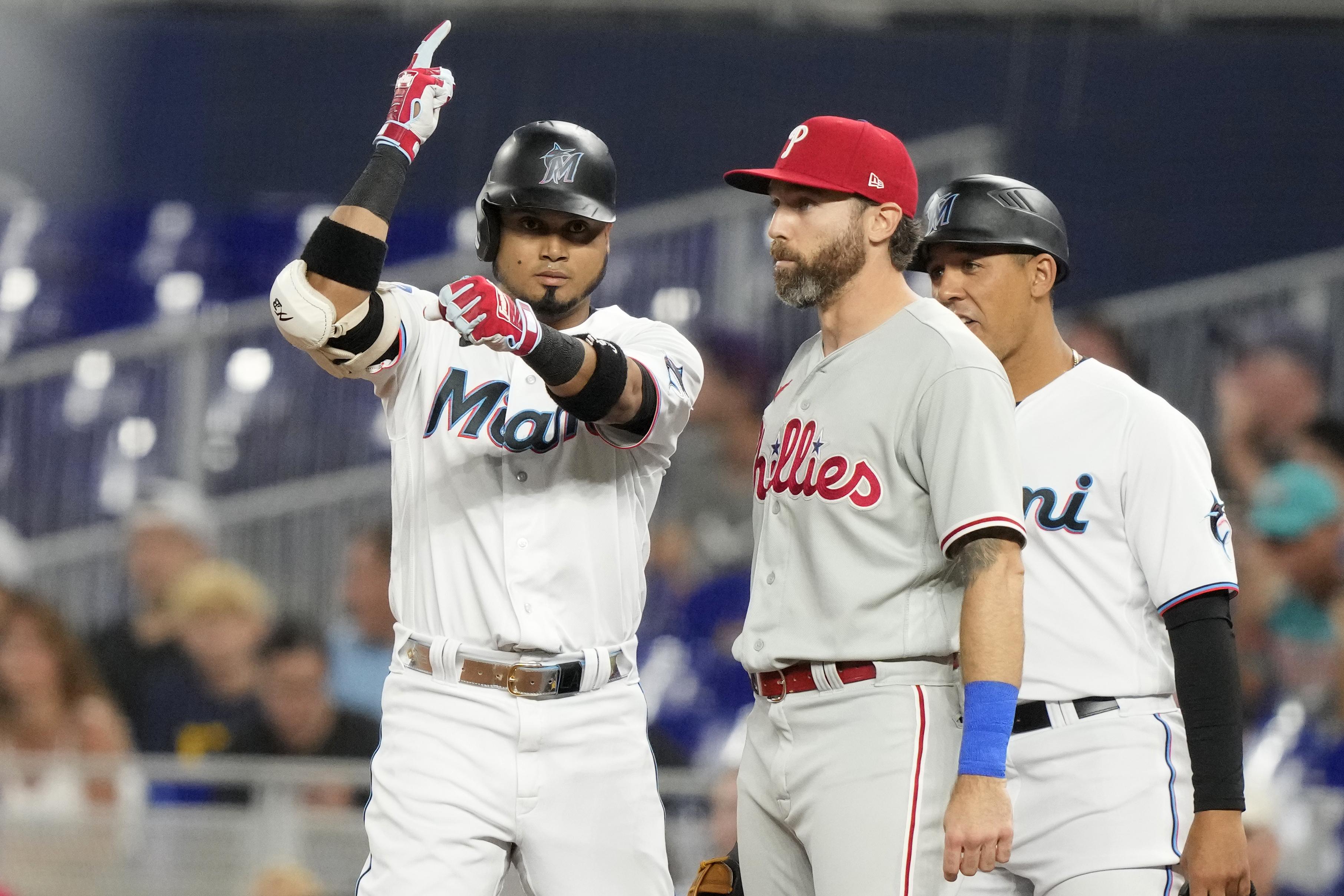 Philadelphia Phillies' Jake Cave hits an RBI sacrifice fly off New