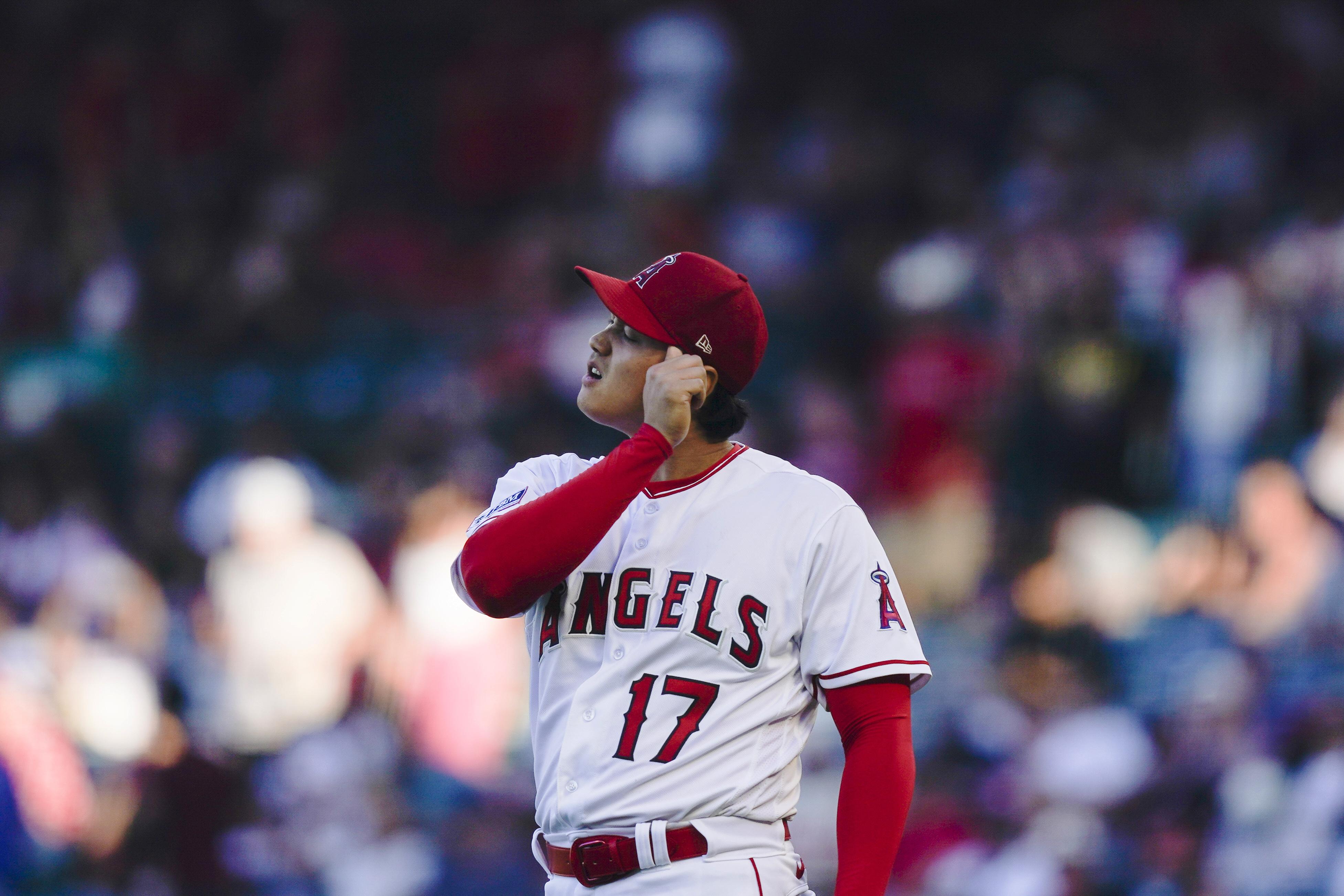 Shohei Ohtani hits 40th homer after leaving mound early with cramps in  Seattle's 5-3 win over Angels