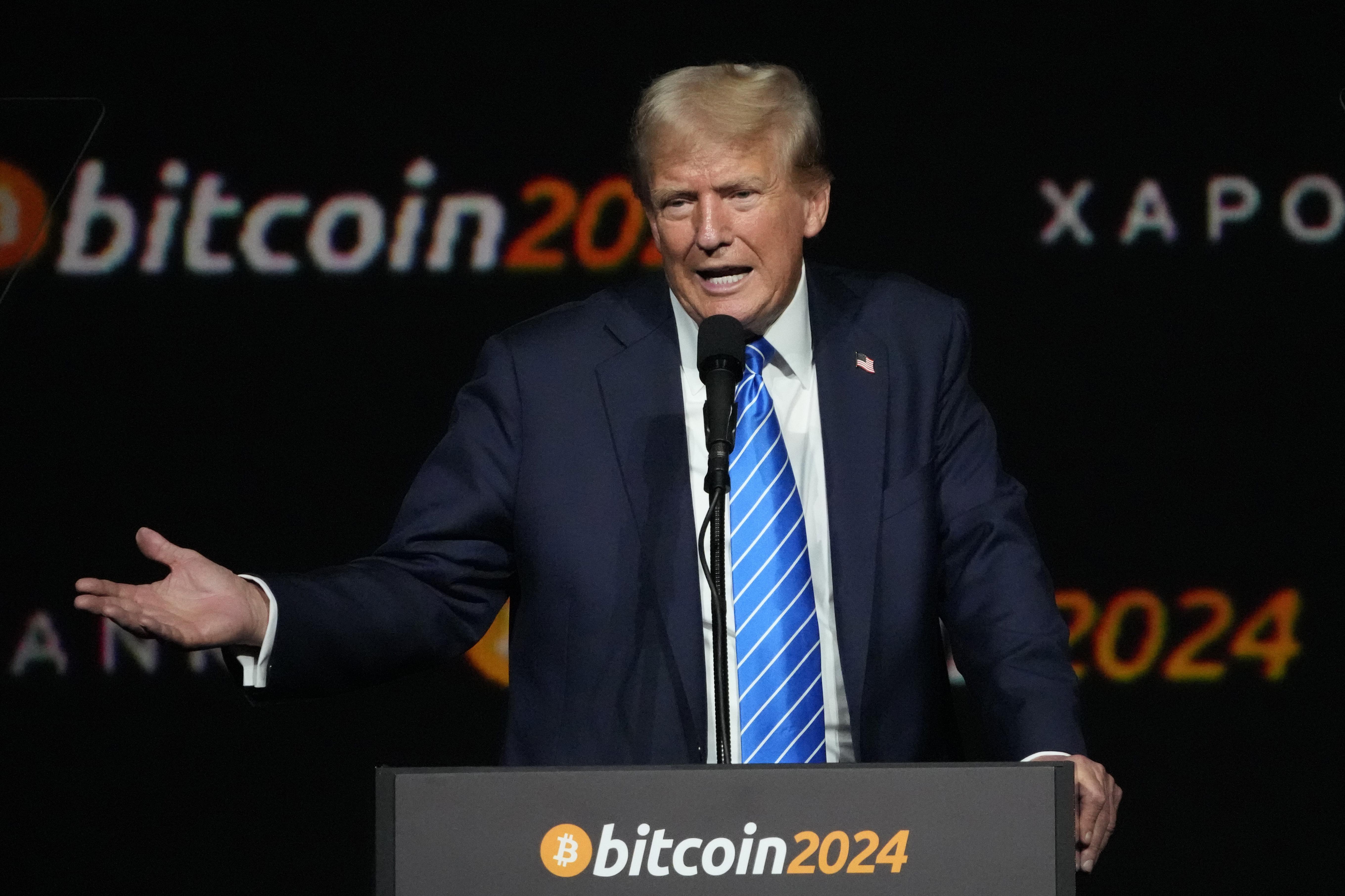 Cryptocurrency group displays outside Capitol a golden statue of Trump  holding a bitcoin | Washington Times
