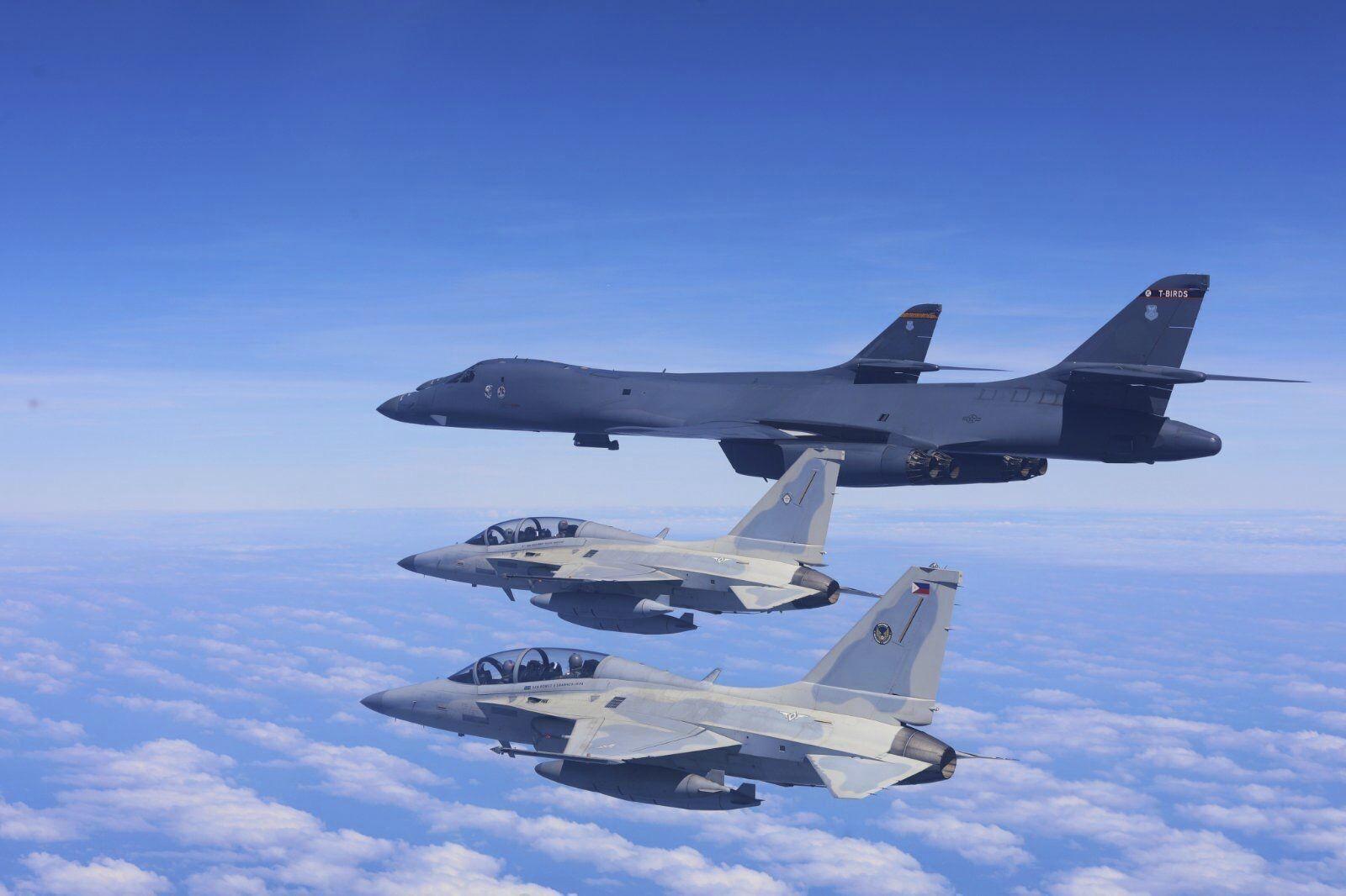 U.S. bombers, Philippines jets fly over disputed shoal claimed by China |  Washington Times